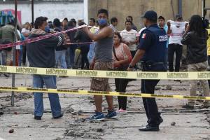 FOTOS. Trifulca en el mercado Hidalgo: seis detenidos, ocho policías golpeados