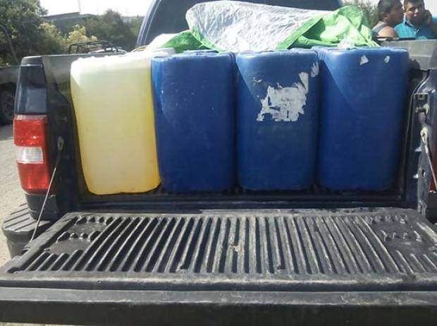 Caen 3 sujetos en Tlacotepec de Benito Juárez con 2 mil litros de hidrocarburo robado