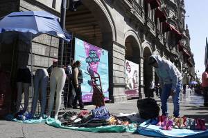 Comerciantes marchan por segunda vez en Puebla para exigir reinstalación