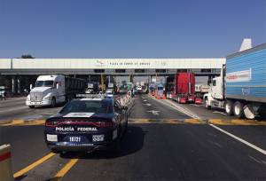 Por sexto día, paso libre en casetas de cobro en autopista México-Puebla