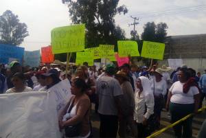Cierran carretera Puebla-Atlixco por secuestros en Temoxtitla
