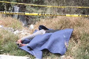 Murió estrangulada mujer arrojada en la autopista México-Puebla