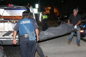 FOTOS: Mujer fue asesinada a balazos en lote de autos del barrio de Xanenetla