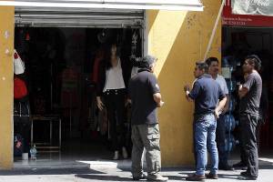 Una persona lesionada, saldo de atraco a negocio de ropa en el centro de Puebla