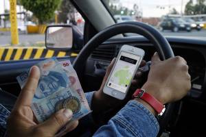 Puebla modificará ley para impedir que Uber cobre en efectivo