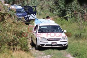 FOTOS: Hallan tres muertos dentro de un vehículo en la colonia Gonzalo Bautista