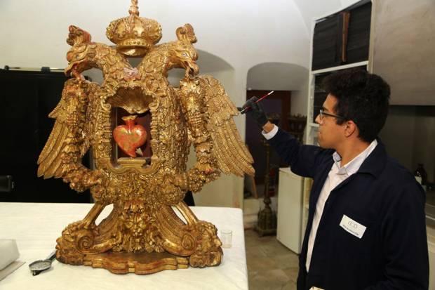 Arte sacro dañado por sismo, restaurado en talleres de Puebla