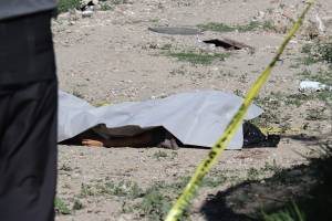 Encuentran cadáver con narcomensaje en el Periférico de Puebla
