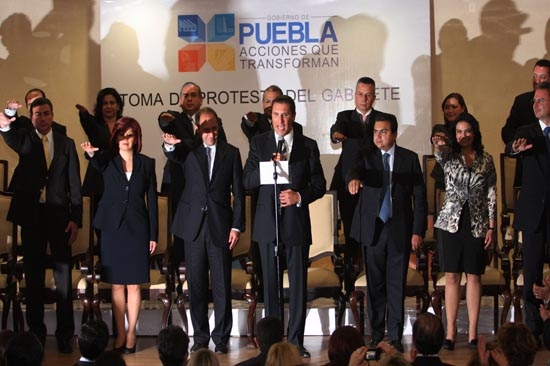 El gobernador y sus colaboradores