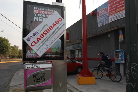 Peña Nieto: ayuntamiento de Puebla clausura su publicidad