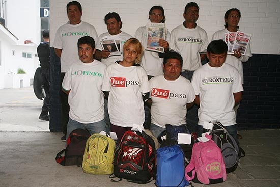 Detienen a 9 personas por repartir propaganda negra en Amalucan