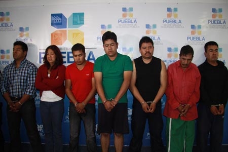 Vigilante del SAT, parte de la banda que asaltó CFE de Plaza Milenio
