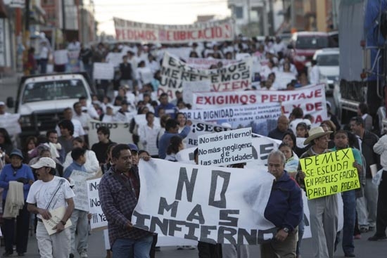 En Texmelucan repudian a Pemex con una marcha; habitantes piden justicia