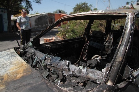 Vándalos, responsables de quema de autos en Atlixco: PGJ
