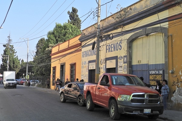 Hallan fuente de San Roque en el interior de un taller mecánico
