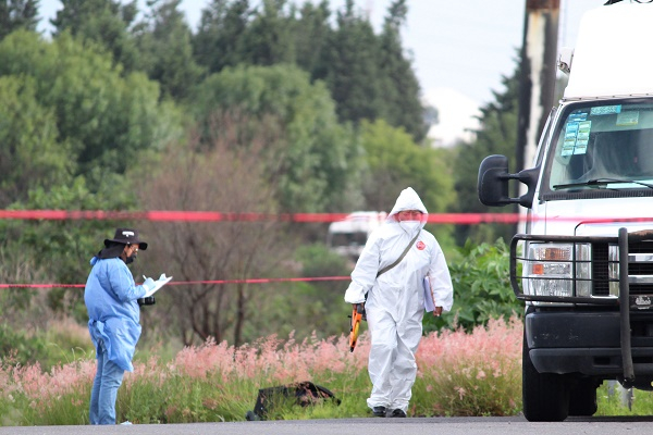 FOTOS: Localizan cuerpo desmembrado dentro de una maleta en Coronango