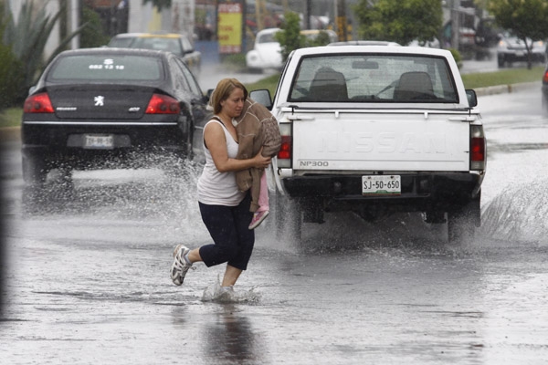 Lluvias muy fuertes en Puebla por canal de baja presión