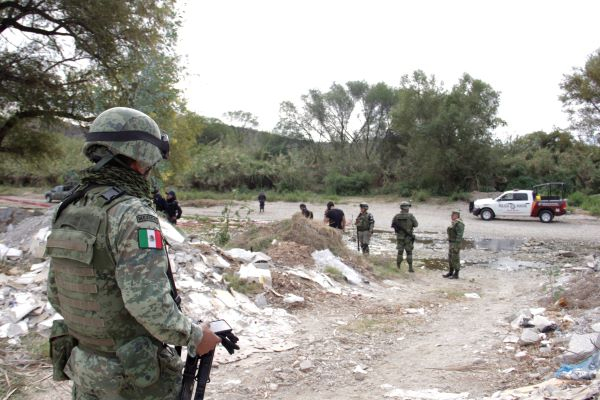 Hallan cadáver de joven en río de Acatlán