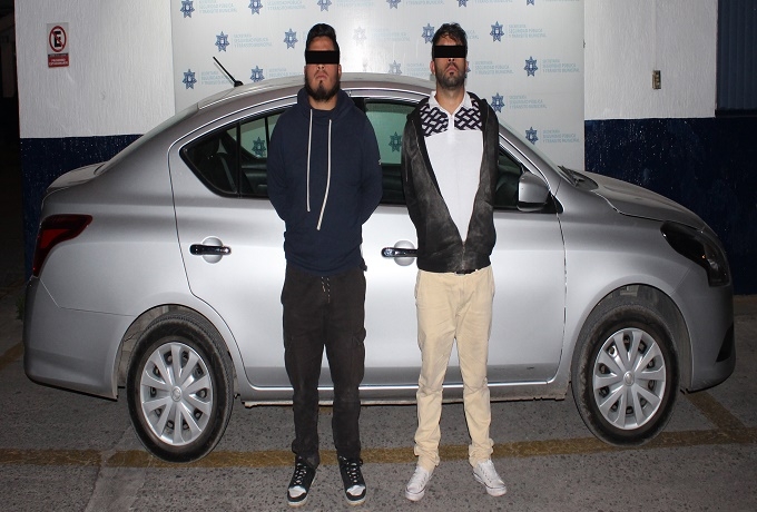 Chofer de Uber y taxista fueron detenidos por robos a comercio en Puebla