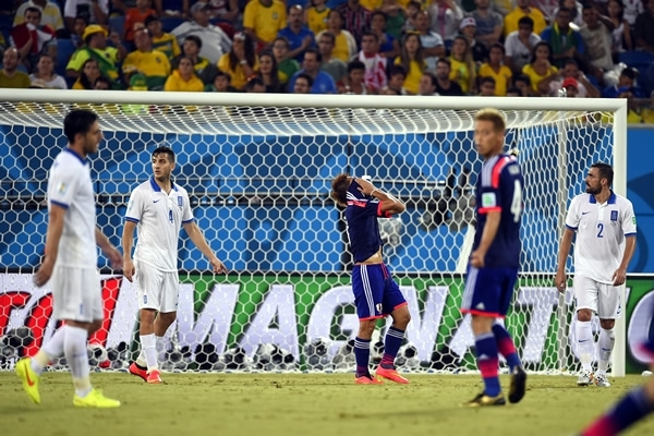 Japón y Grecia repartieron puntos y aun viven en el Mundial