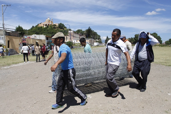 Protestan por expropiación de terrenos aledaños a la pirámide en Cholula