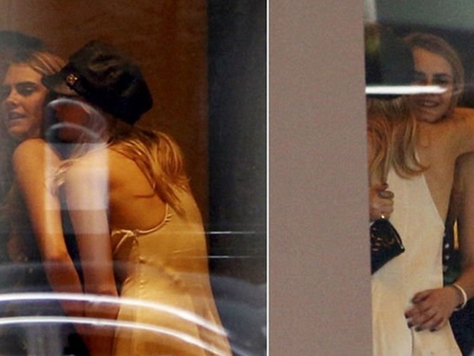 Novia de Bradley Cooper, captada cariñosamente con Cara Delevingne