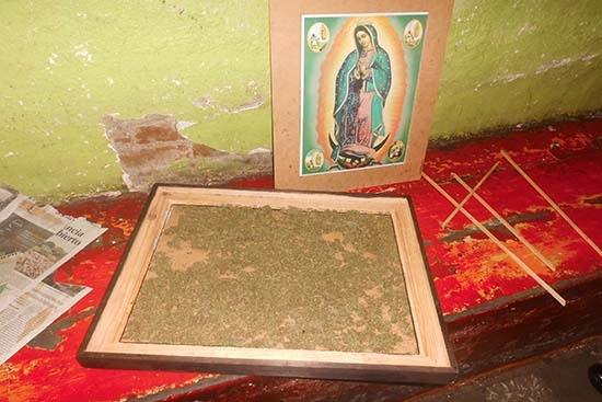 Mujer intentó meter mariguana al Cereso de Tepeaca en cuadro religioso