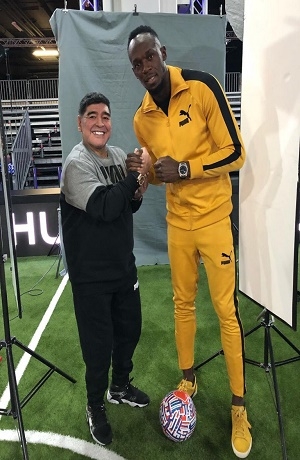 Maradona coquetea con Usain Bolt para incorporarlo a Dorados