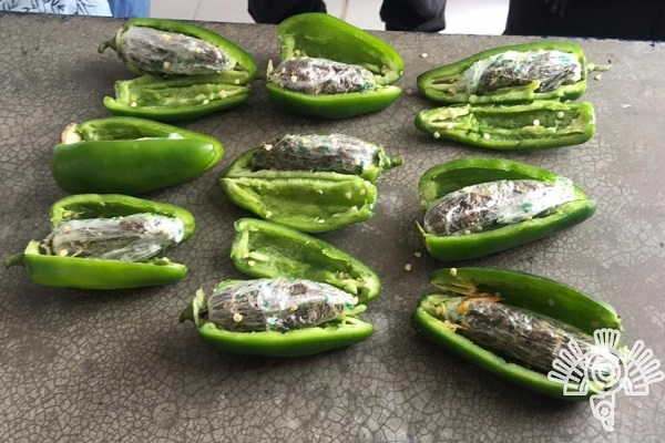 Intentó ingresar chiles rellenos de droga al penal de Tehuacán