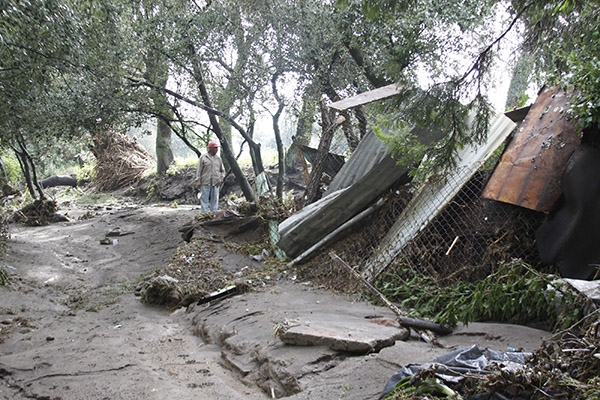 Tromba desborda río en Huejotzingo; viviendas y caminos afectados