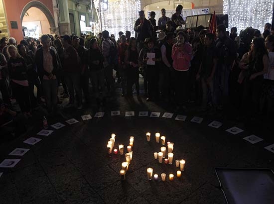 Sin incidentes, marchas por Ayotzinapa en Puebla: Gobierno estatal