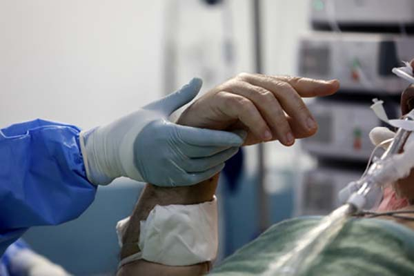 Cobran 128 poblanos seguro médico por COVID-19