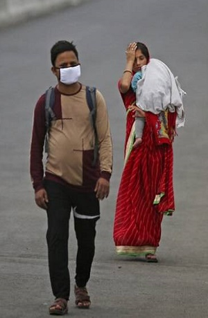 Padres bautizaron a sus mellizos Corona y Covid en la India