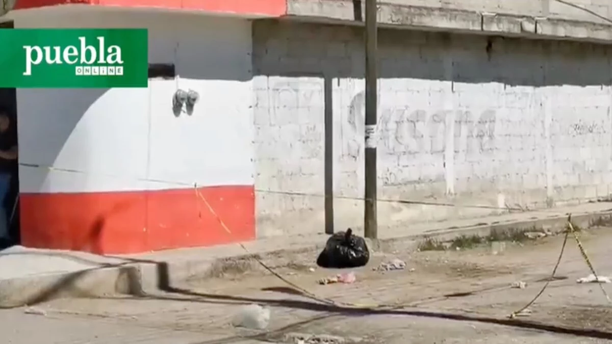 Hallan feto entre bolsas de basura en Puebla